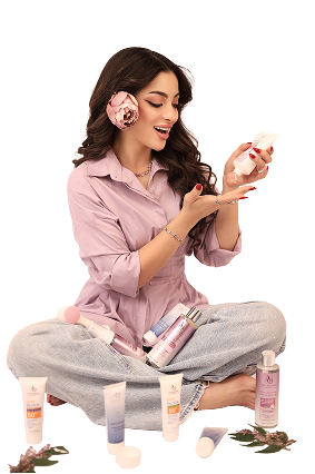 Model with Aseel Elqasass skincare products